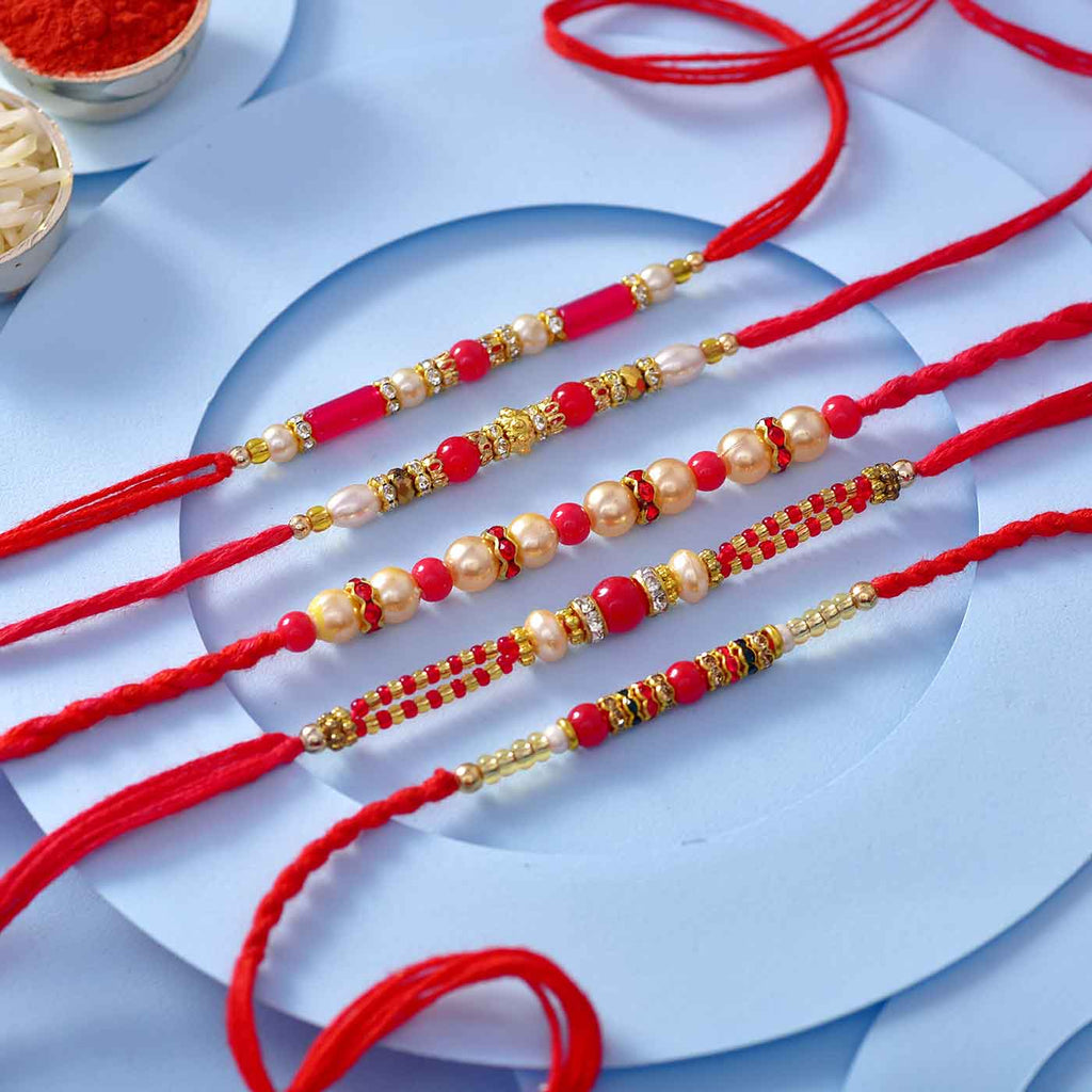 Beautiful Set Of 5 Pearls & Red Beads Rakhis