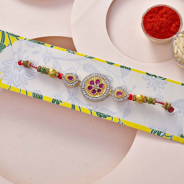 Stone Studded Floral Dial Rakhi With Beads Work