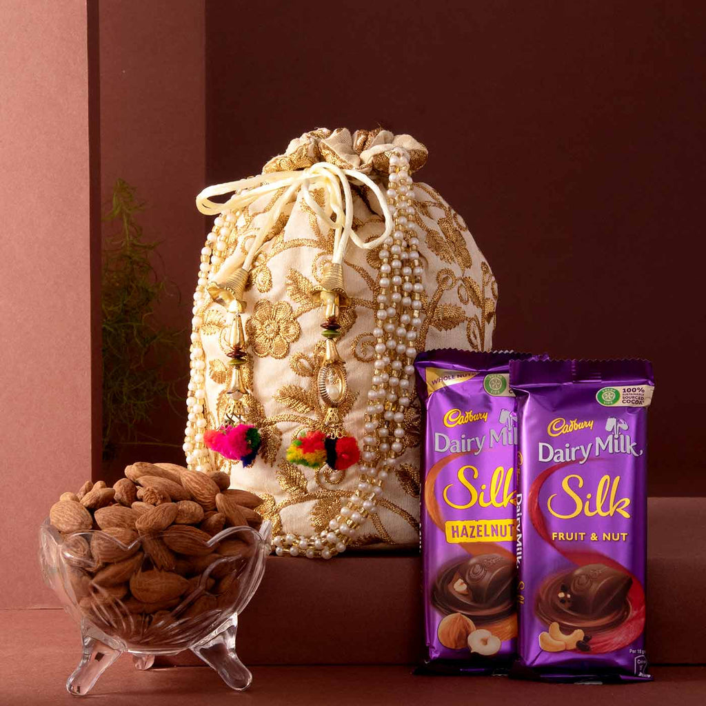 Attractive Potli Bag With Almonds & Cadbury's Hamper