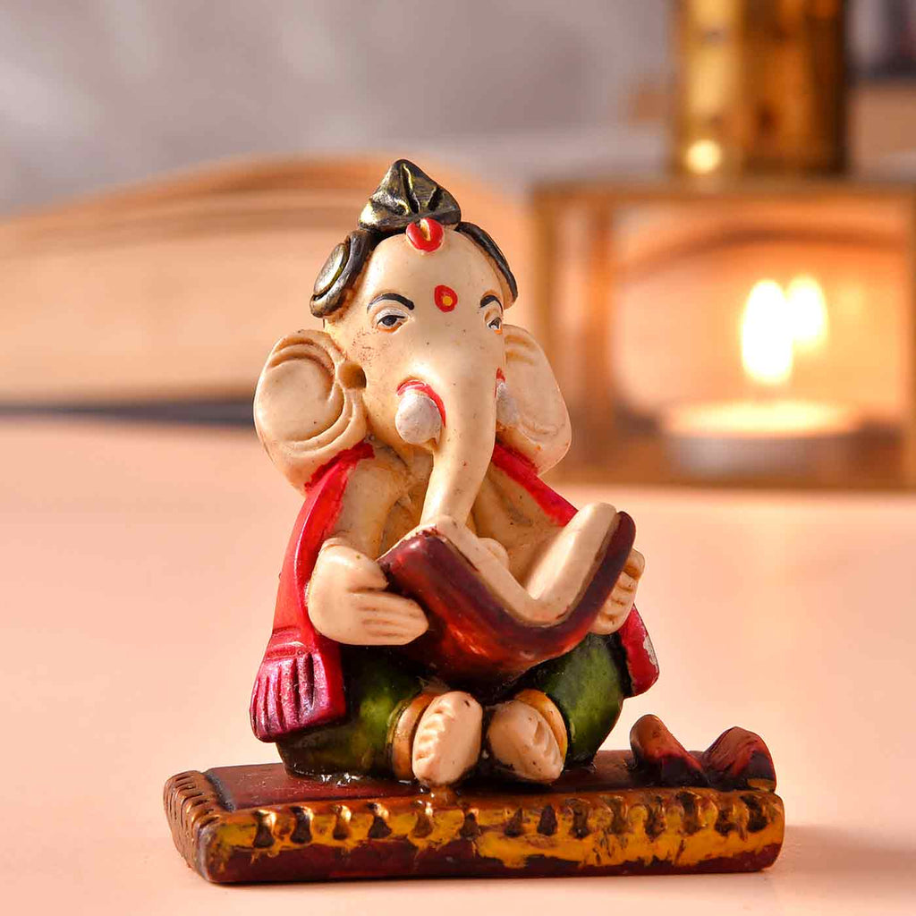 Reading Ganesha Figurine