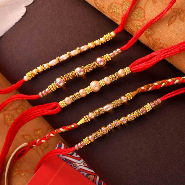 Enticing Set Of 5 Beads Rakhis With Batisha Slice