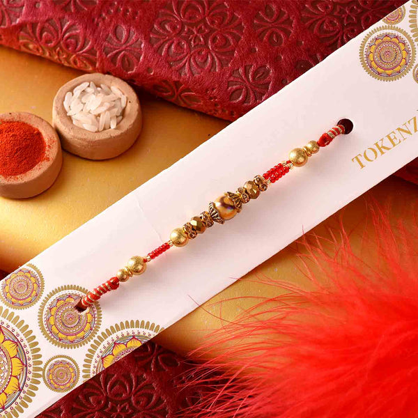 Stunning Pearls Rakhi With Mewa Bite
