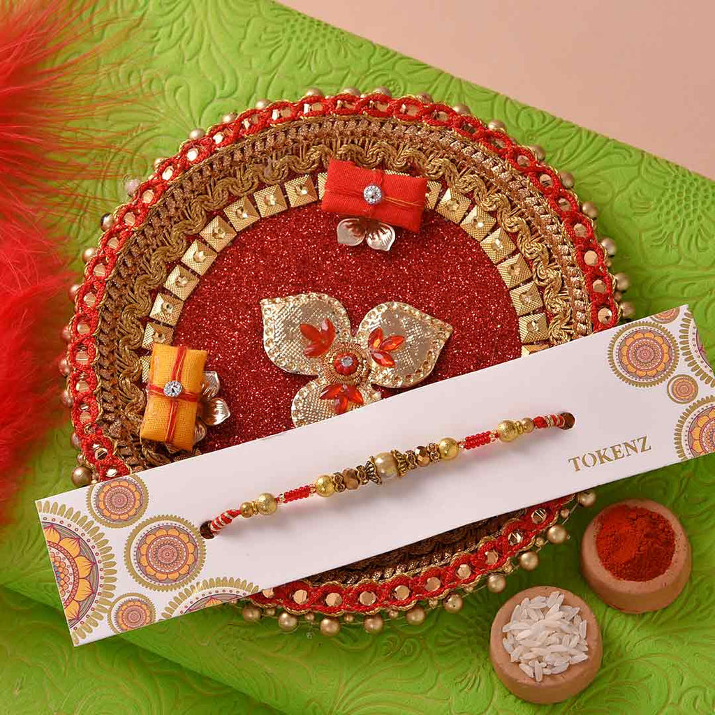 Red Glittering Pooja Thali With Beautiful Pearls Rakhi