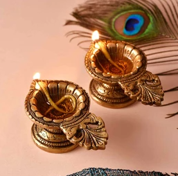 Light up your home with these beautiful brass idol diyas