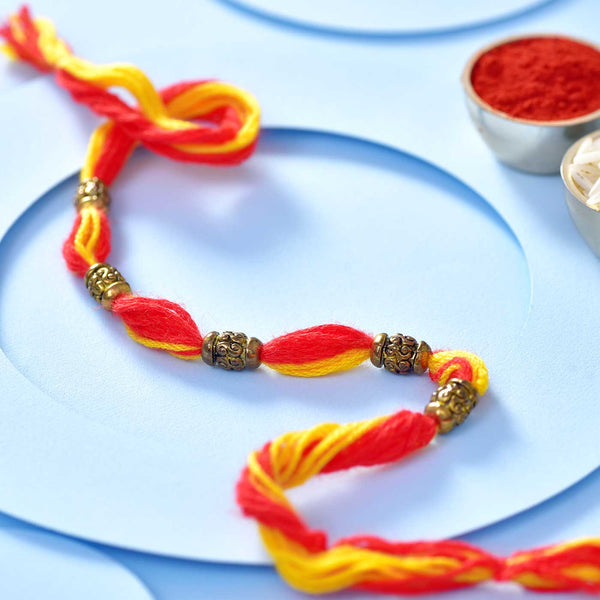 Ethnic Antique Finish Beads On Mauli Rakhi Thread