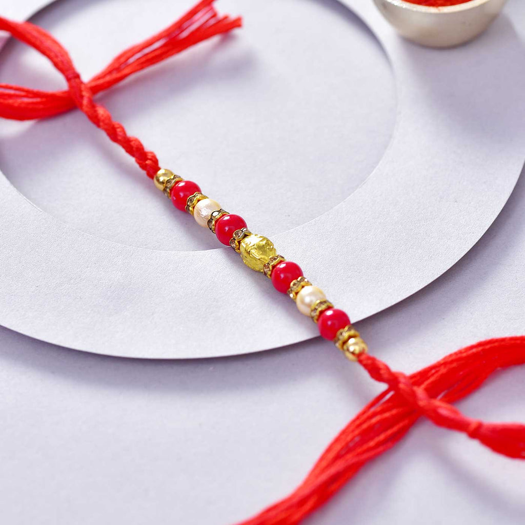 Spectacular Red Beads & Pearls Rakhi Thread