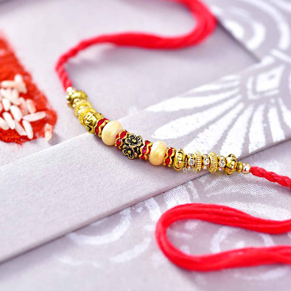 Floral Pattern Pearls & Stone Work Rakhi Thread