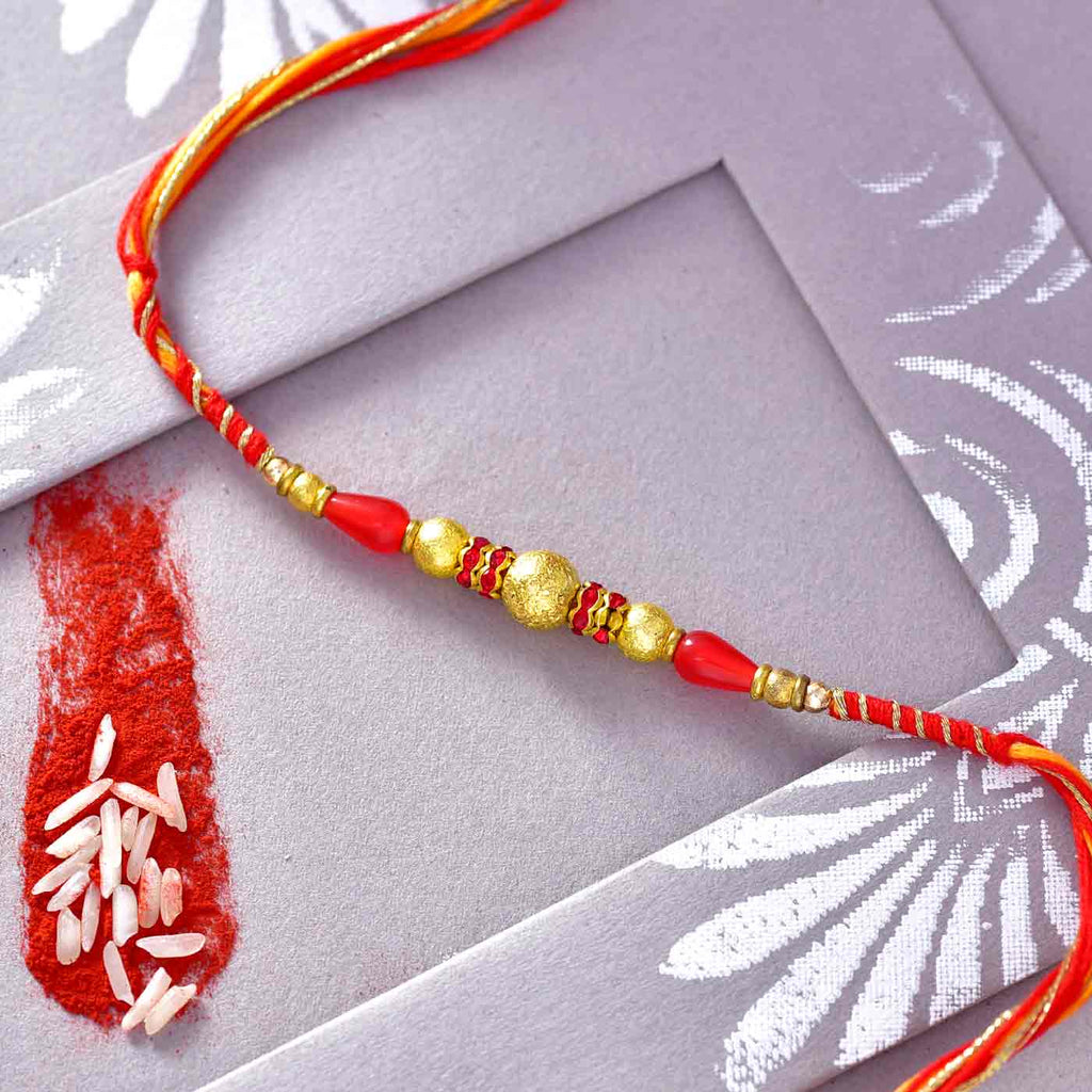 Beautiful Golden & Red Beads Rakhi Thread