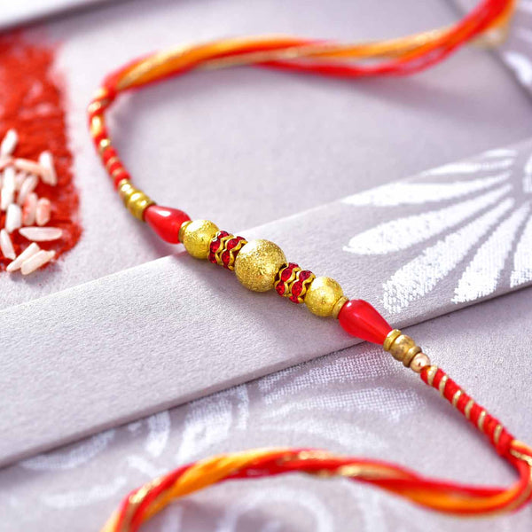 Beautiful Golden & Red Beads Rakhi Thread