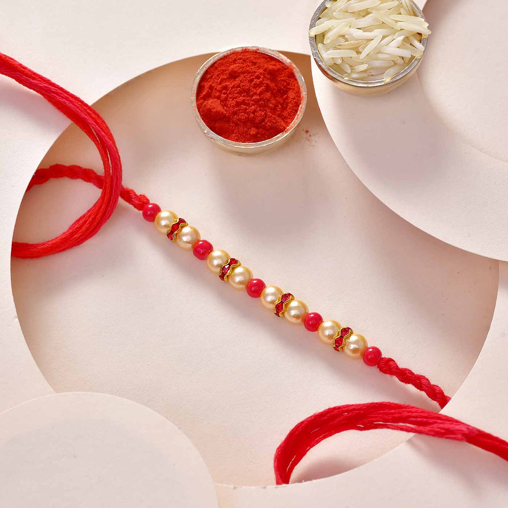 Gorgeous Pearls & Red Beads Rakhi Thread