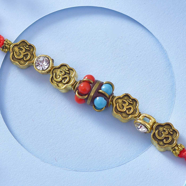 Gracious Om Rakhi With Beads