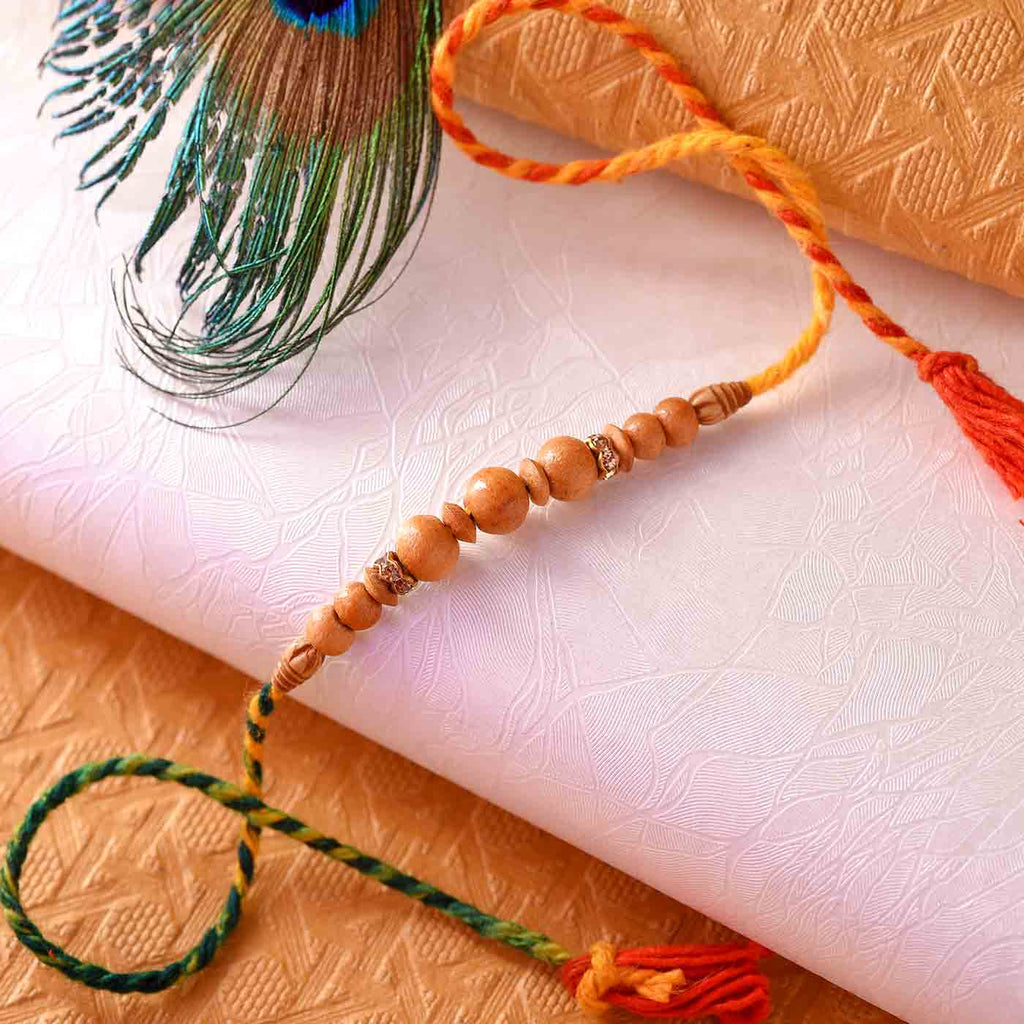Sandalwood Beads Rakhi With Colourful Mauli