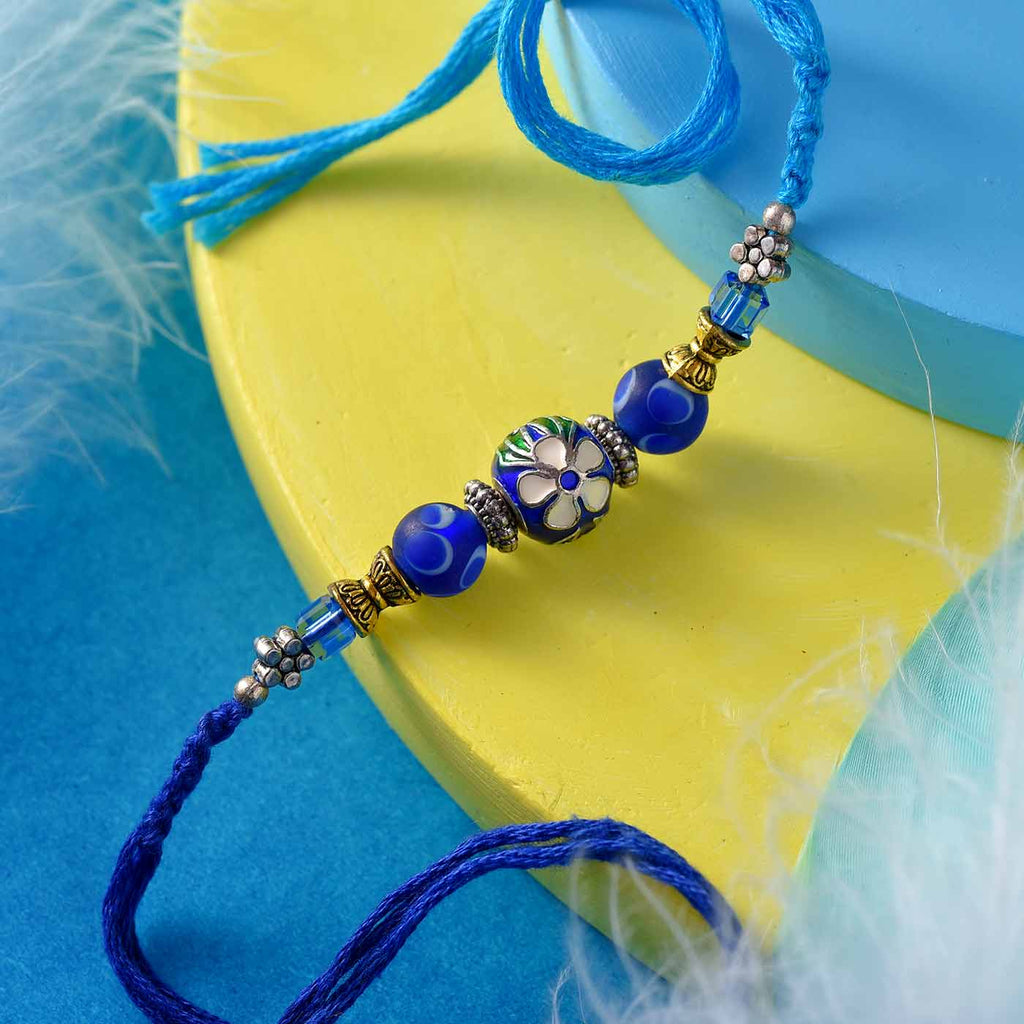 Round Kundan With Blue Beads Rakhi