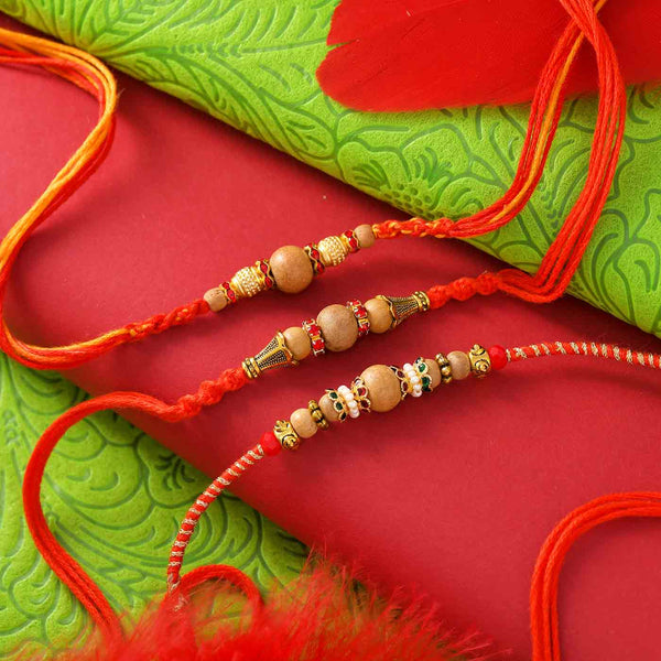 Blissful Sandalwood Beads Rakhi Set Of 3