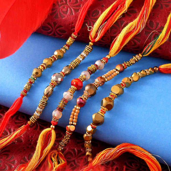 Beads Set Of 5 Rakhis With Kaju Kesar Barfi