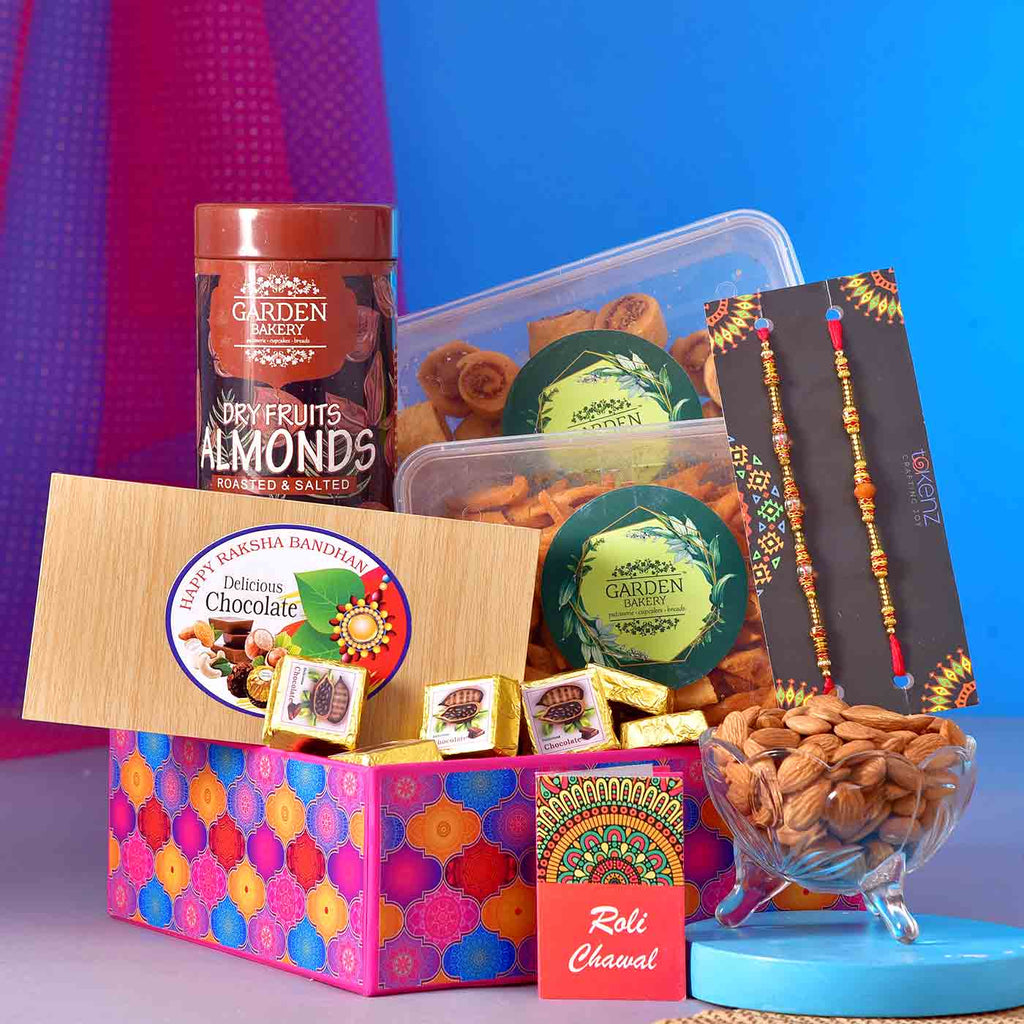 Alluring Set Of 2 Beads Rakhi With Chocolate, Namkeen & Tray