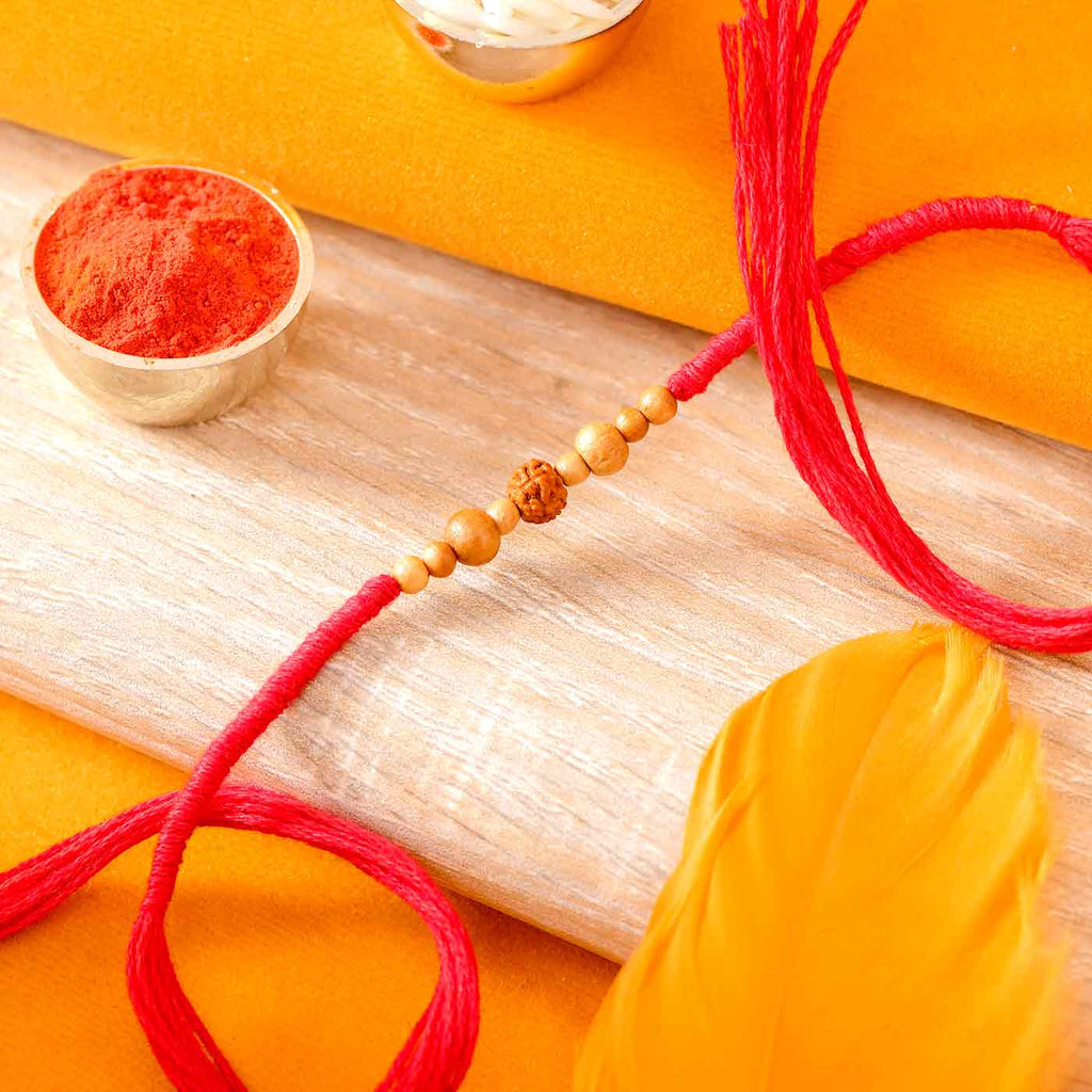 Rudraksh & Sandalwood Rakhi In Mauli