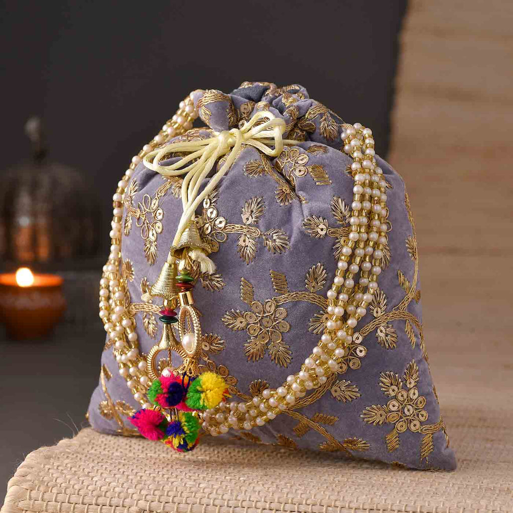Beautiful Zari Work Mauve Potli Bag