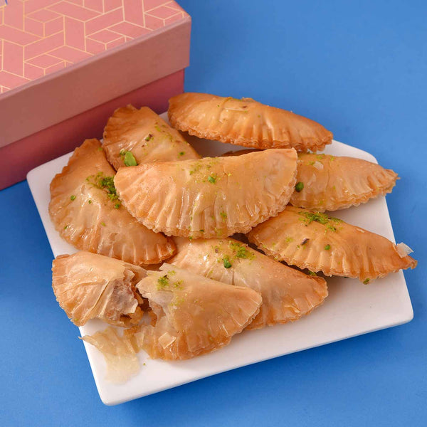 Delightful Hamper Of Turkish Gujiya With Fragrant Gulal