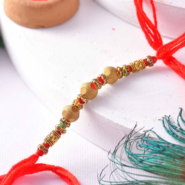Delicate Red and Golden Mauli Rakhi