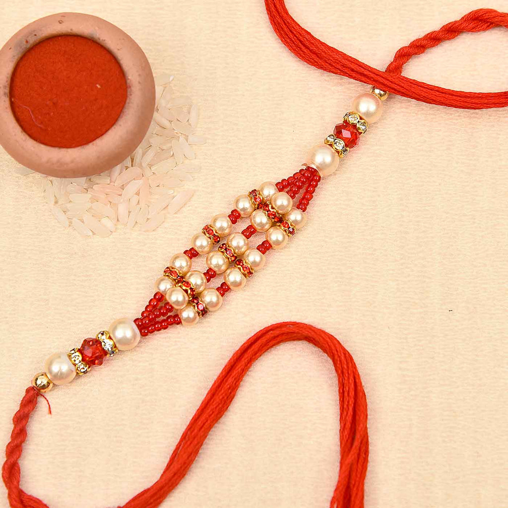Fancy Pearls & Red Beads Rakhi