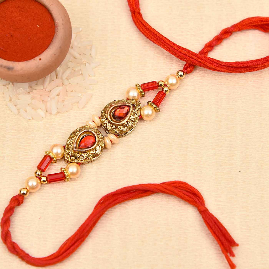 Metallic Look Red Stone & Pearls Rakhi