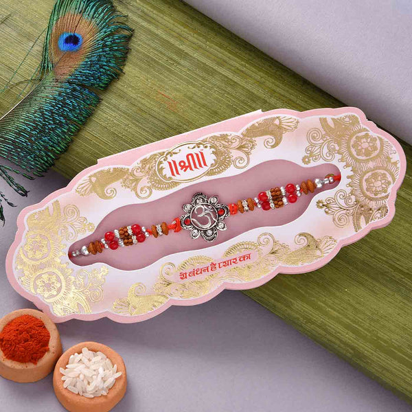 Om Beads Rakhi With Batisa Slice