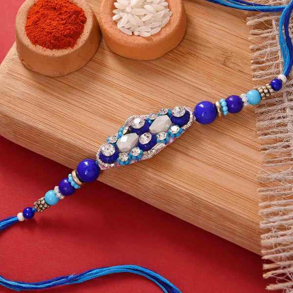 Fancy Blue Beads & Stones Rakhi With Pistachios & Cashewnuts