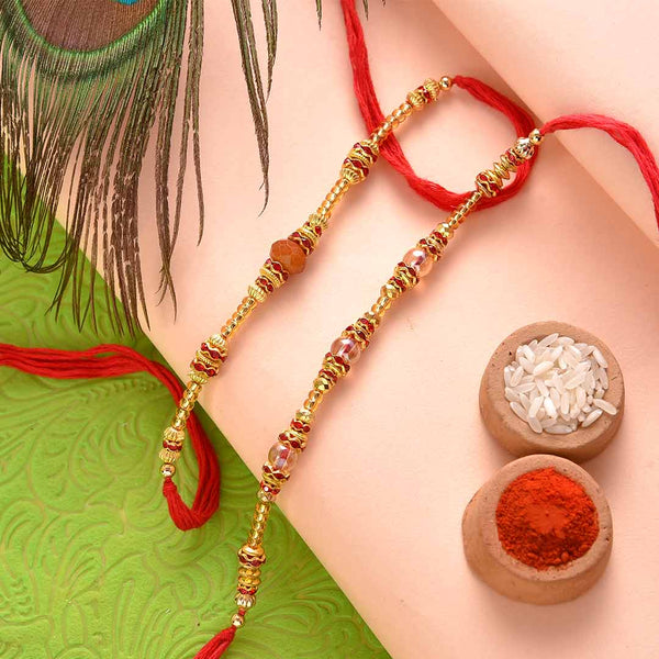 Classy Set Of 2 Beads & Pearls Rakhi With Besan Laddoos
