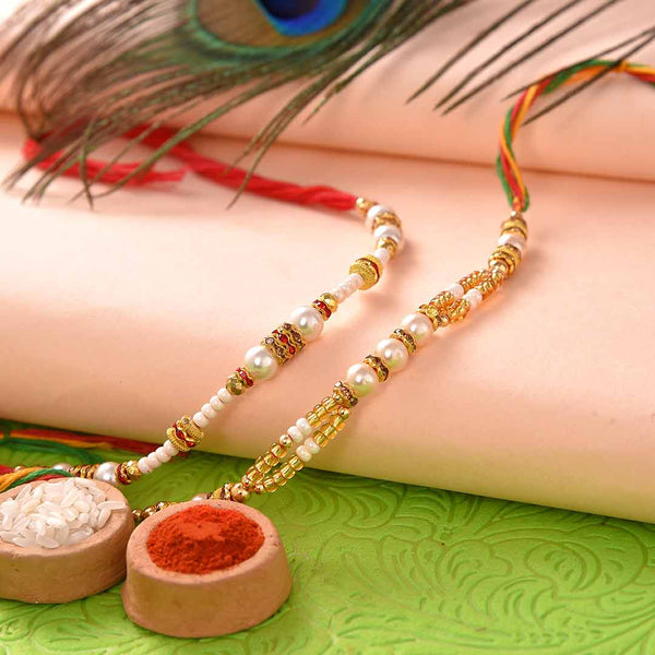 Beautiful Set Of 2 Pearls Rakhi With Mathura Peda