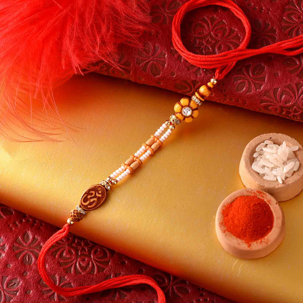 Om Floral Beads Rakhi With Figberry
