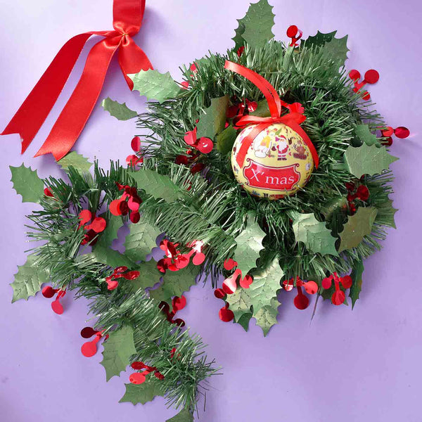 Classy Hamper With Decoratives, Chocolate, Santa Cap, Wreath & Basket
